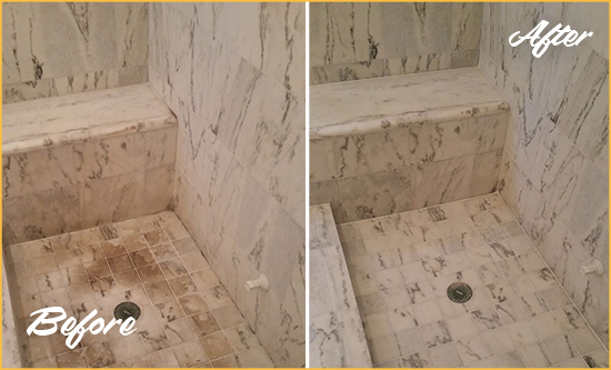 Before and After Picture of a Dirty Kitsap Lake Marble Shower Cleaned to Eliminate Dark Stains